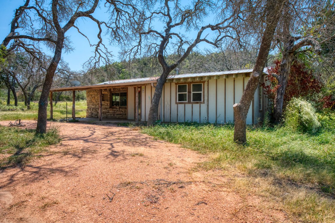 51 D S Road Fredericksburg, TX 78624 - Photo 10 of 19 a house with trees in front of it