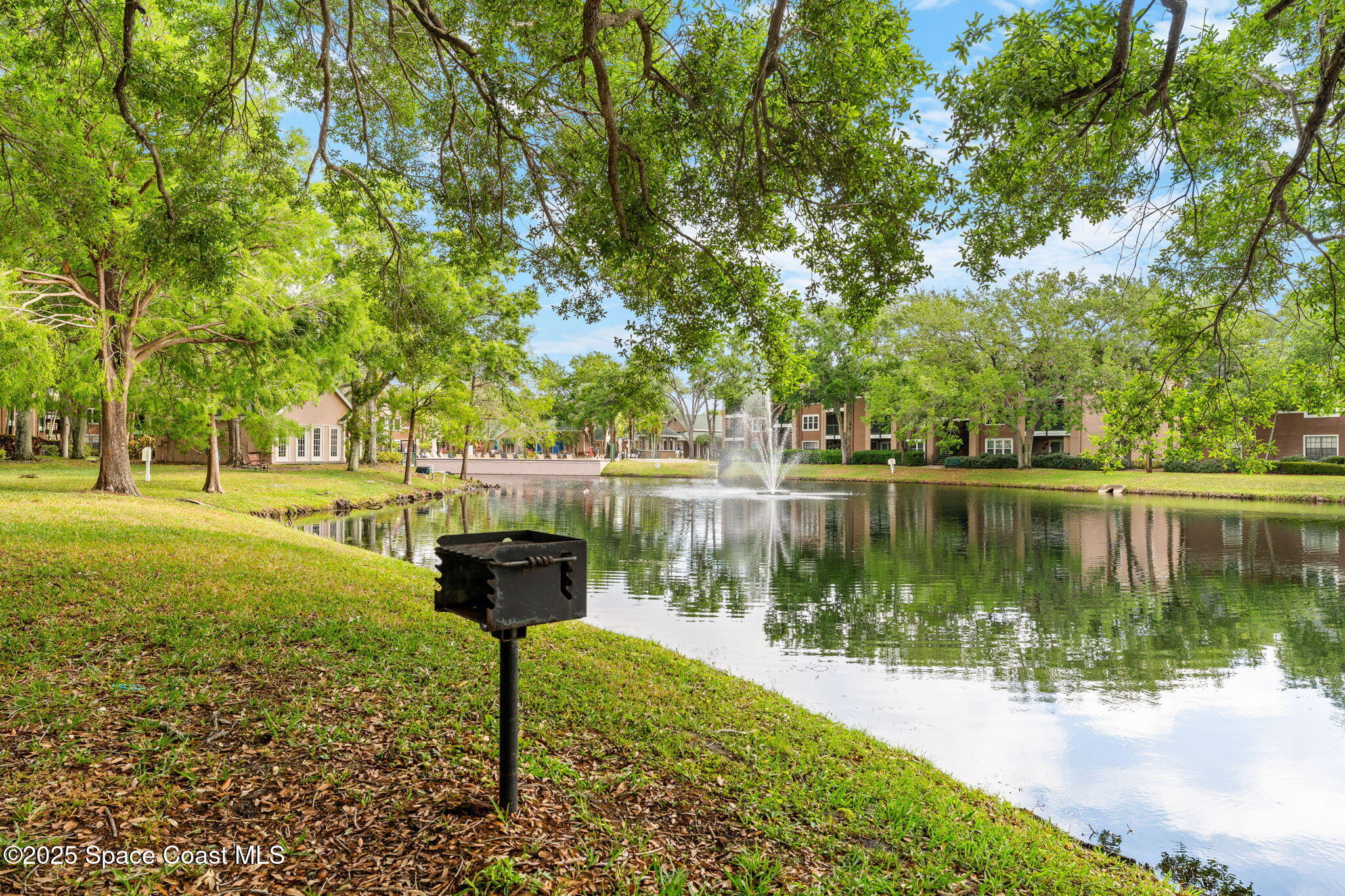 7667 North Wickham Road, Unit 514 Melbourne, FL 32940 - Photo 30 of 37 a lake view with a lake view