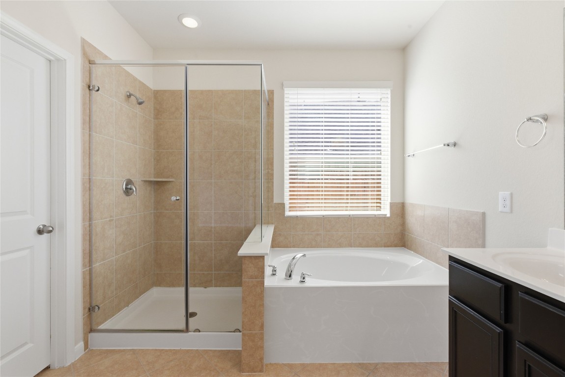 3418 Delta Drive Rosharon, TX 77583 - Photo 21 of 38 a bathroom with a bathtub and a shower