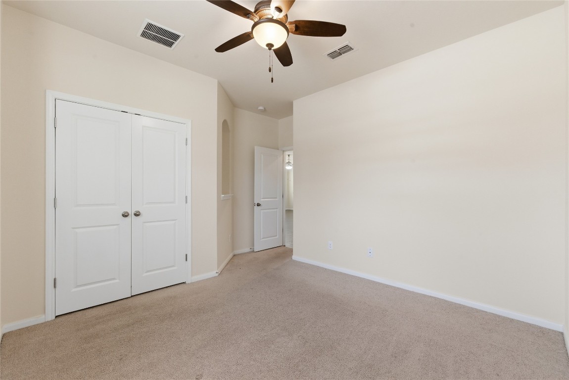 3418 Delta Drive Rosharon, TX 77583 - Photo 25 of 38 a view of an empty room and a ceiling fan