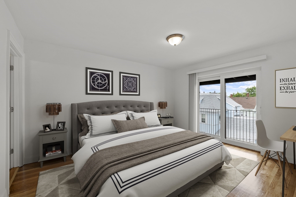 134 Summer Street, Unit 37 Malden, MA 02148 - Photo 2 of 10 a bedroom with a bed and a view of bedroom