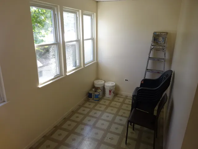 a view of a room with a window