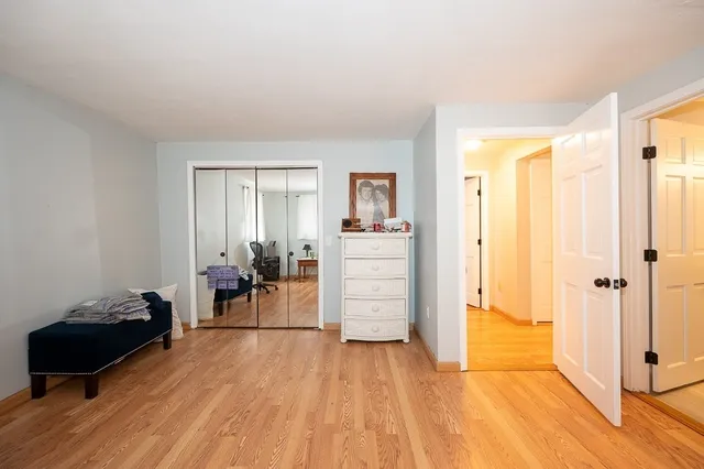 wooden floor and windows in a room with a hardwood