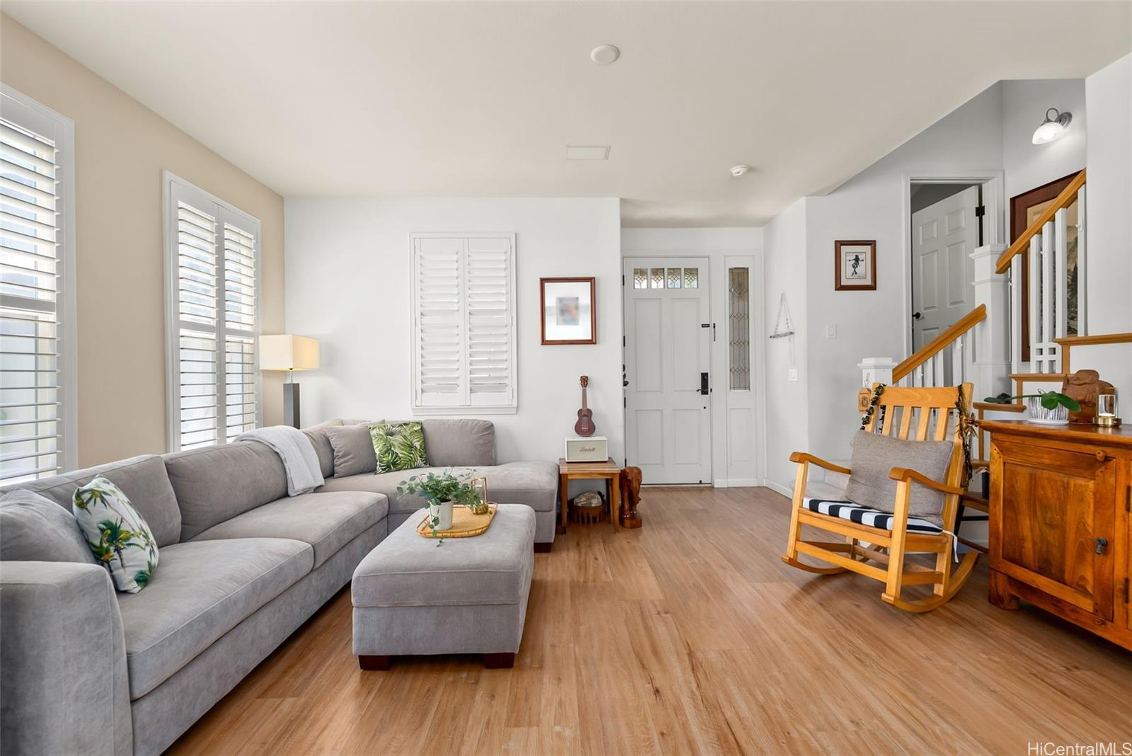 520 Lunalilo Home Road, Unit 310 Honolulu, HI 96825 - Photo 5 of 23 Another view of the living area looking towards the front door. Steps lead to the powder room on the landing and if you head further up, you'll find the primary suite, 2 guest bedrooms, laundry area and full bath