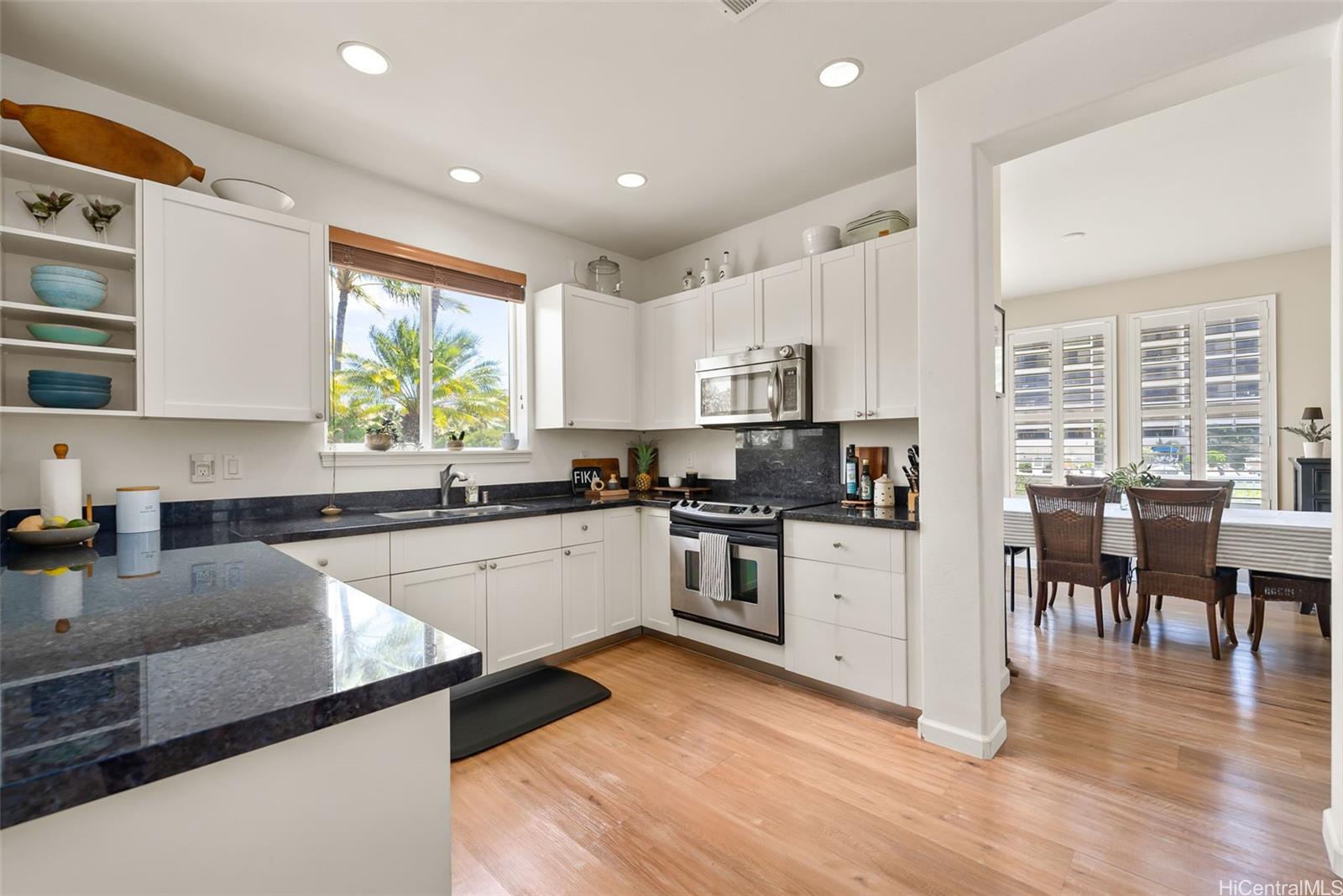 520 Lunalilo Home Road, Unit 310 Honolulu, HI 96825 - Photo 7 of 23 Kitchen with the dining room on the right.