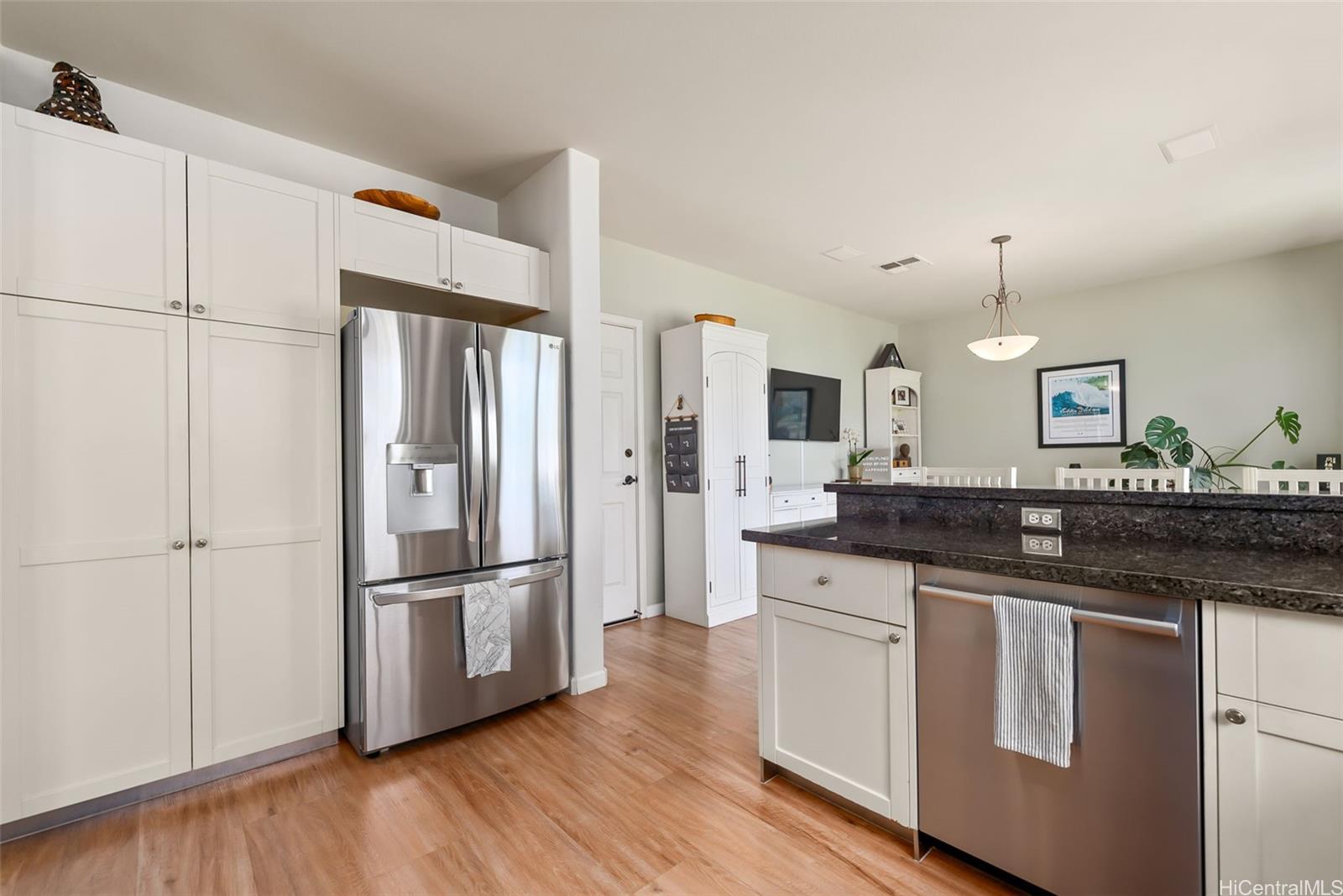 520 Lunalilo Home Road, Unit 310 Honolulu, HI 96825 - Photo 8 of 23 Another view of the kitchen with breakfast bar.