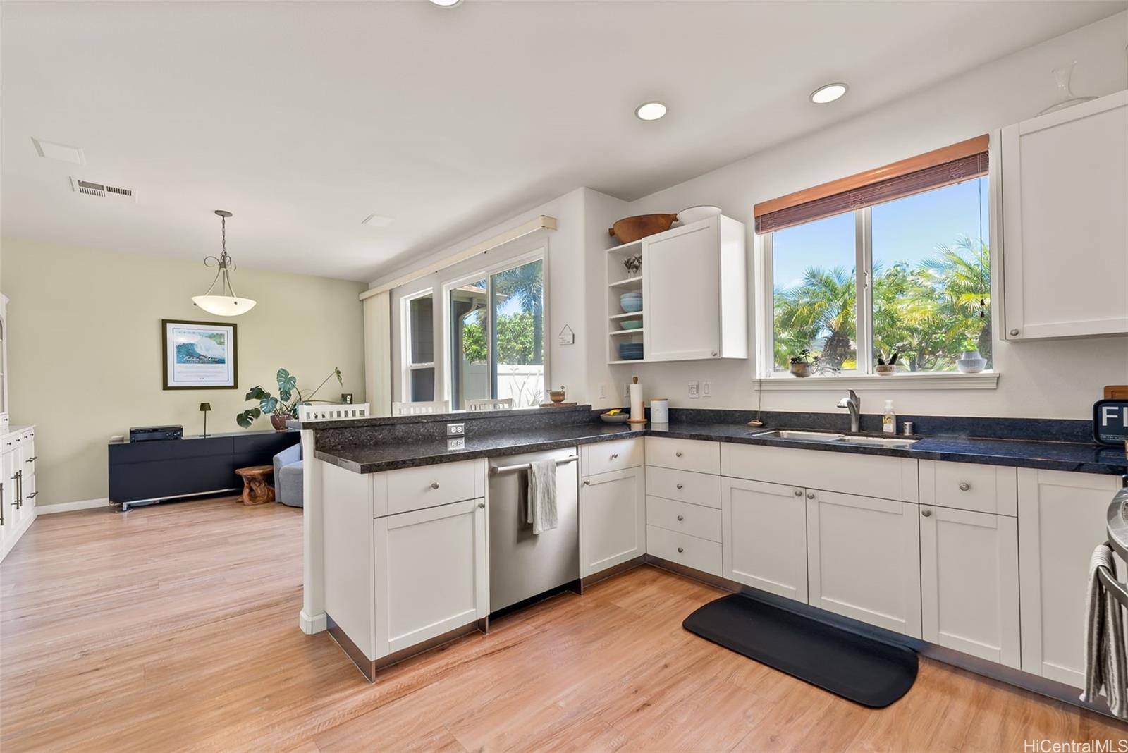 520 Lunalilo Home Road, Unit 310 Honolulu, HI 96825 - Photo 9 of 23 Another view of the kitchen with the den in the background.