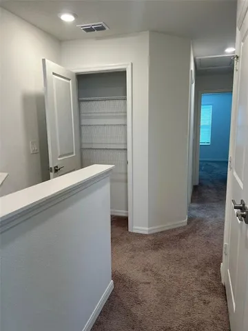 a view of storage and utility room