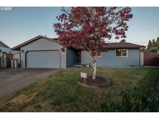 a house view with a garden space