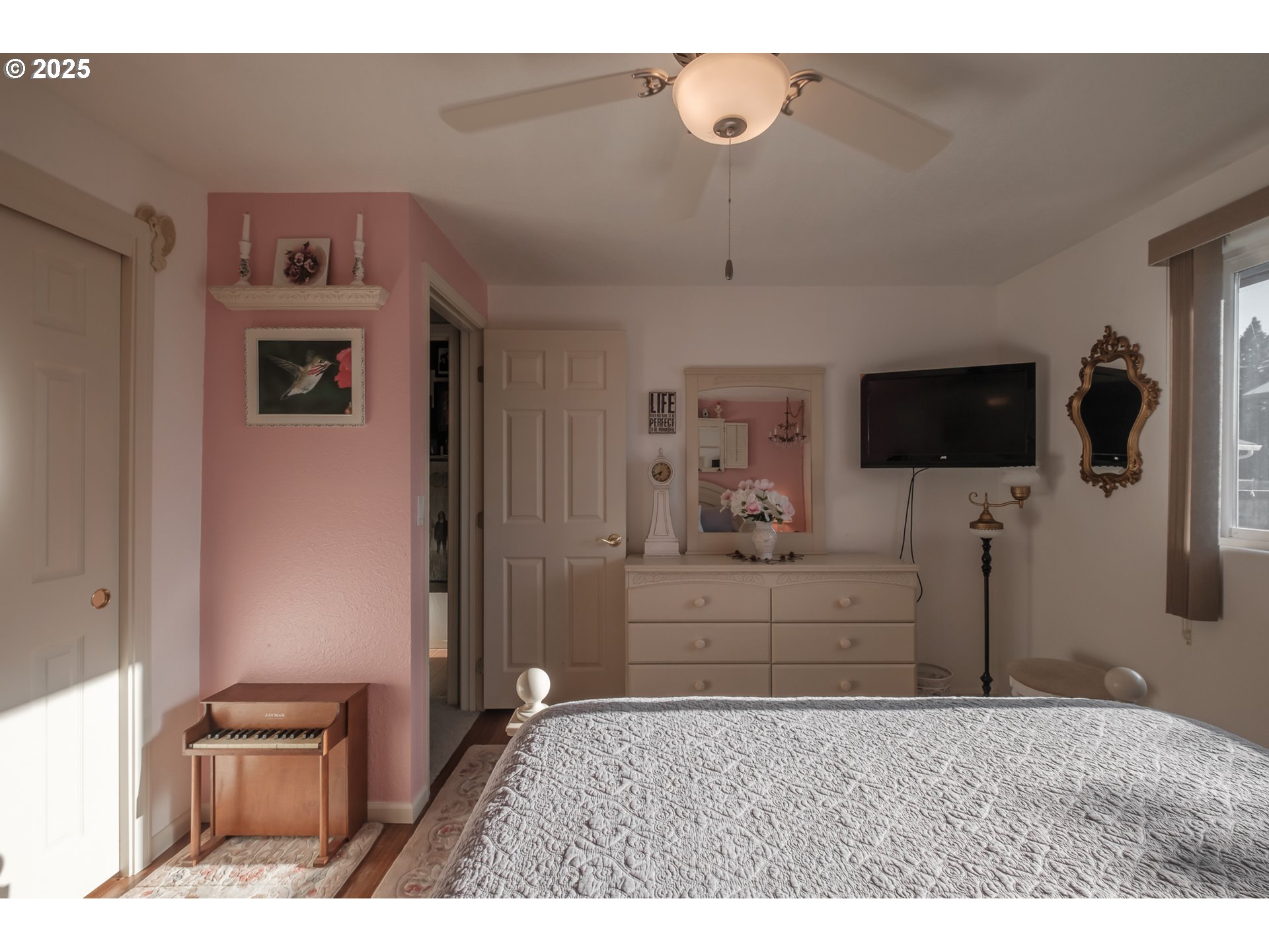 2669 Southeast Chicago Street Albany, OR 97322 - Photo 11 of 31 a bedroom with a bed and flat screen tv