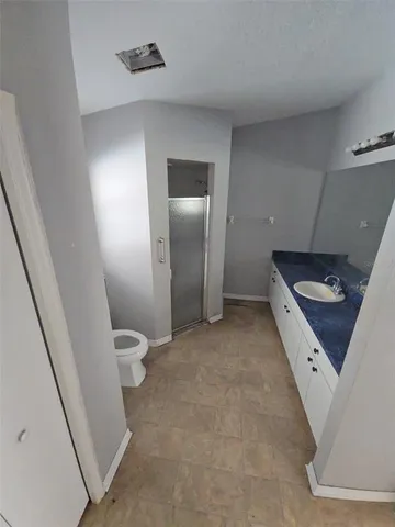 a view of livingroom with furniture and hardwood floor