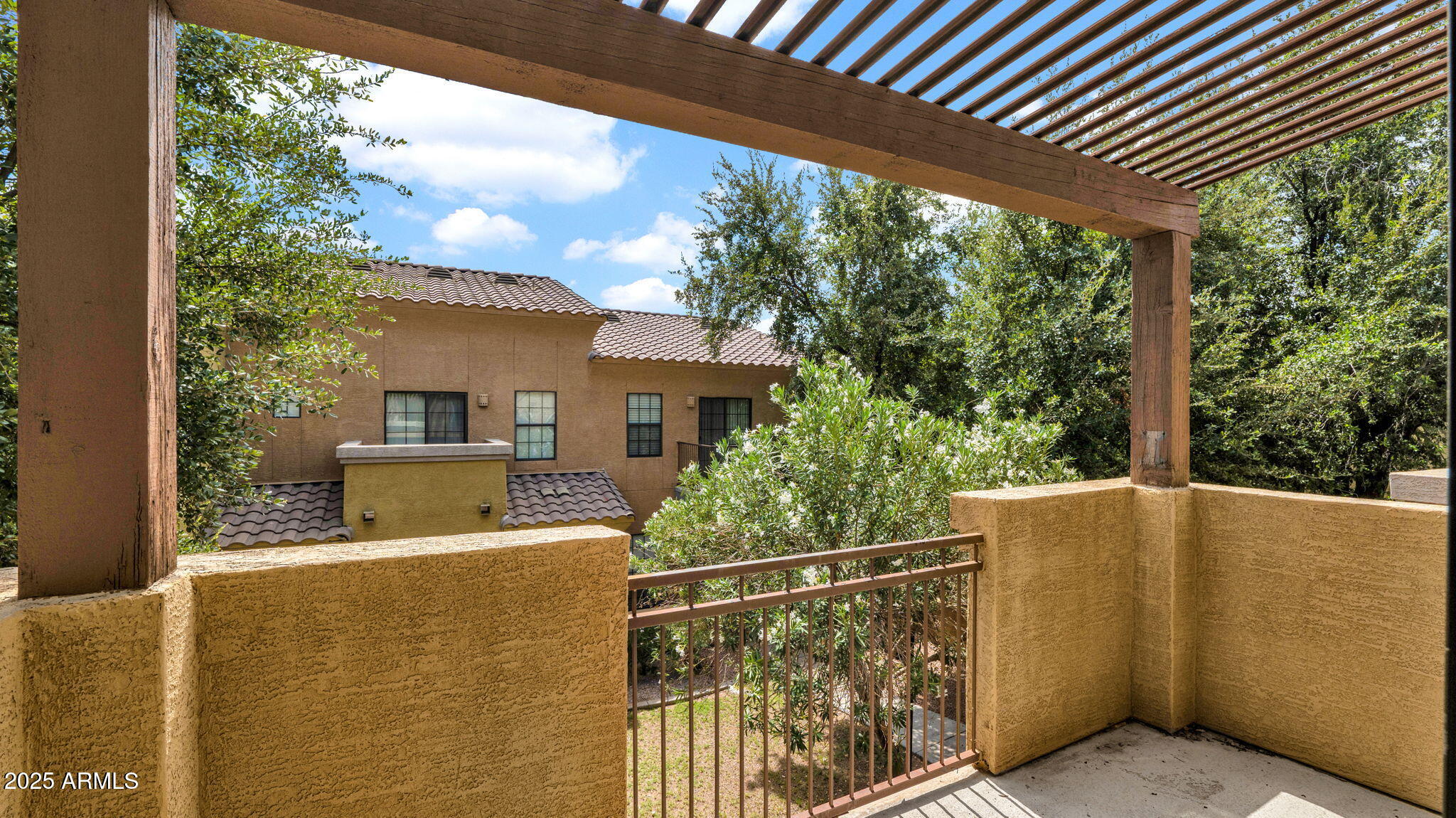 1702 East Bell Road, Unit 113 Phoenix, AZ 85022 - Photo 14 of 32 a view of a house with a balcony