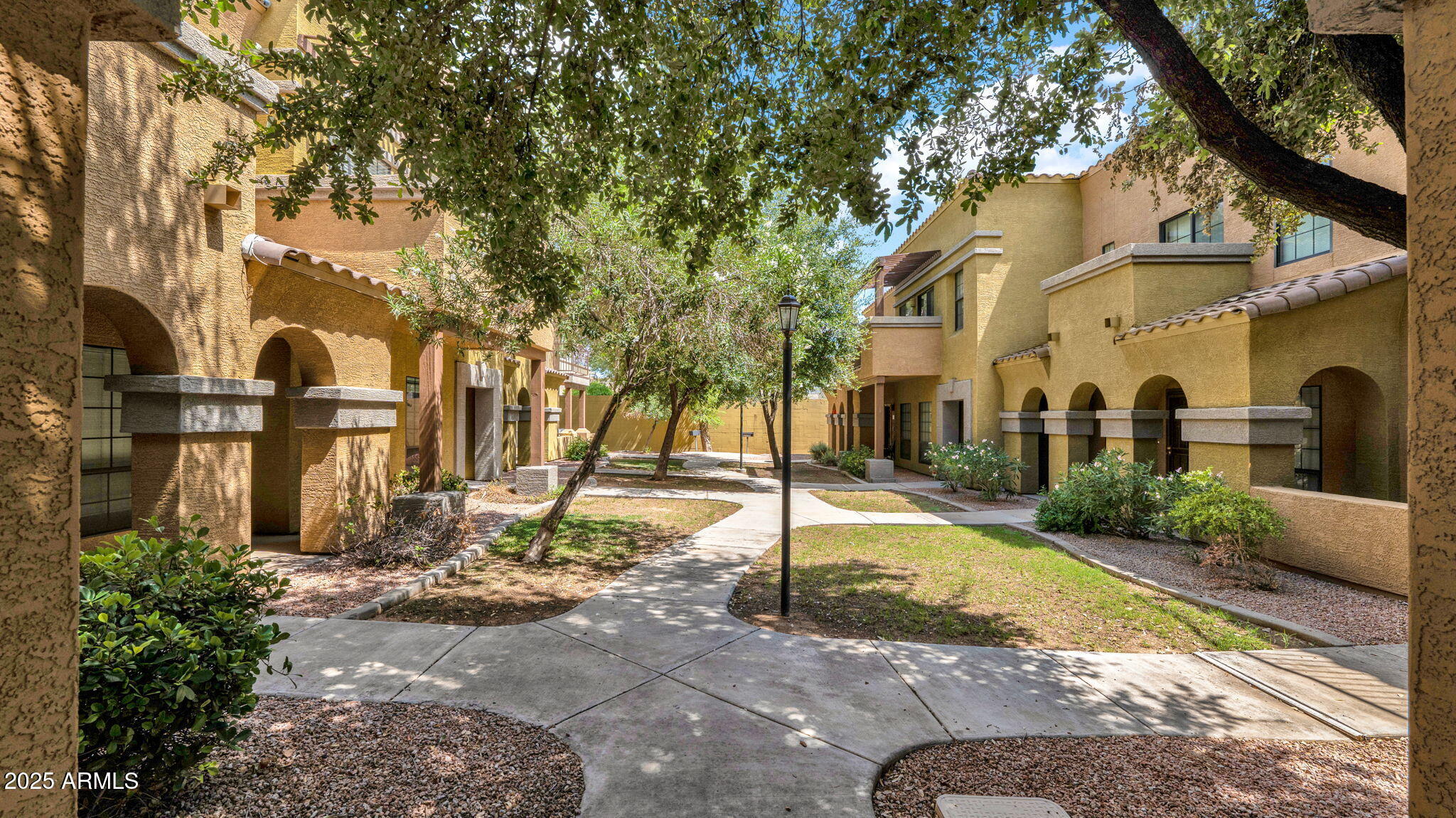 1702 East Bell Road, Unit 113 Phoenix, AZ 85022 - Photo 2 of 32 a view of a street in front of a building