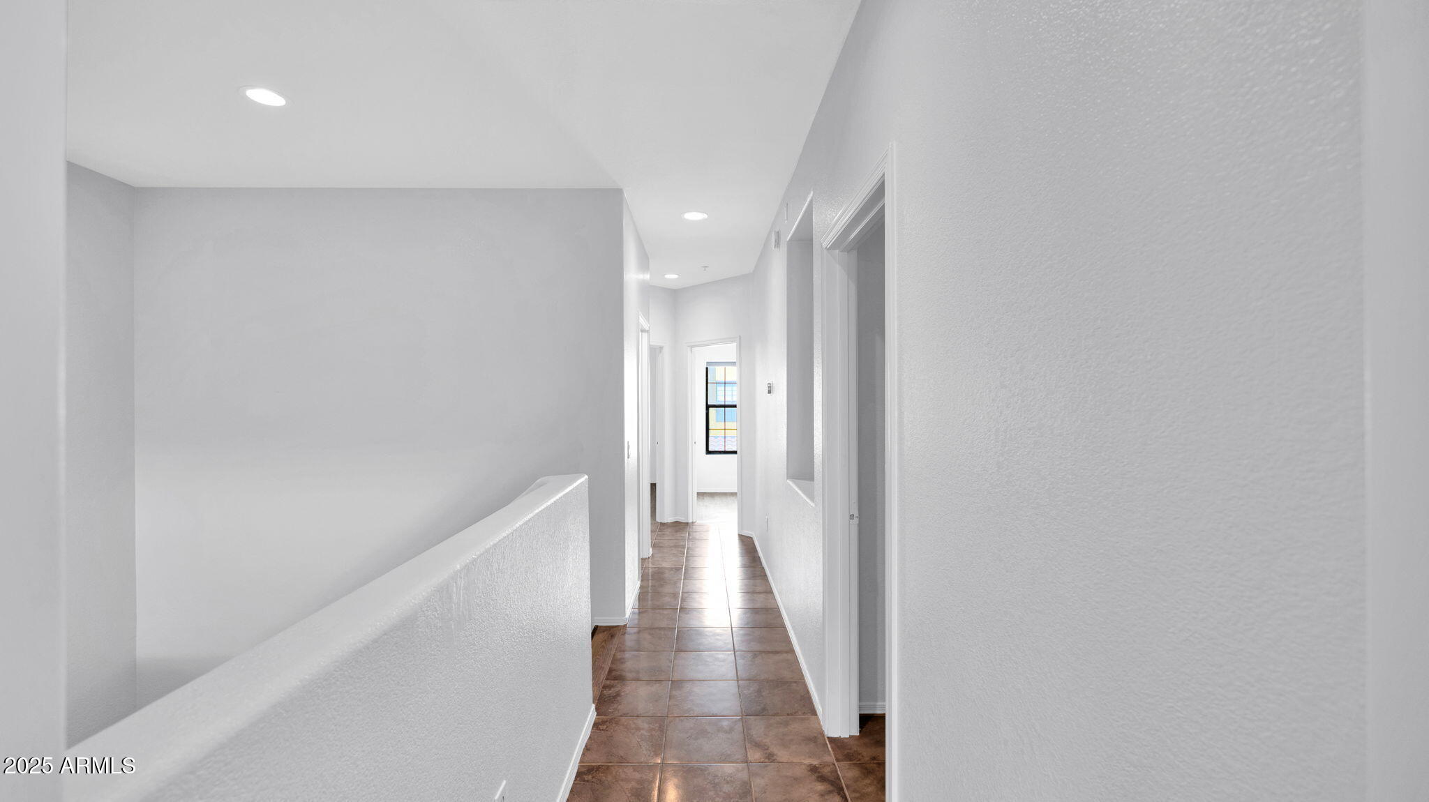1702 East Bell Road, Unit 113 Phoenix, AZ 85022 - Photo 22 of 32 a view of hallway with wooden floor