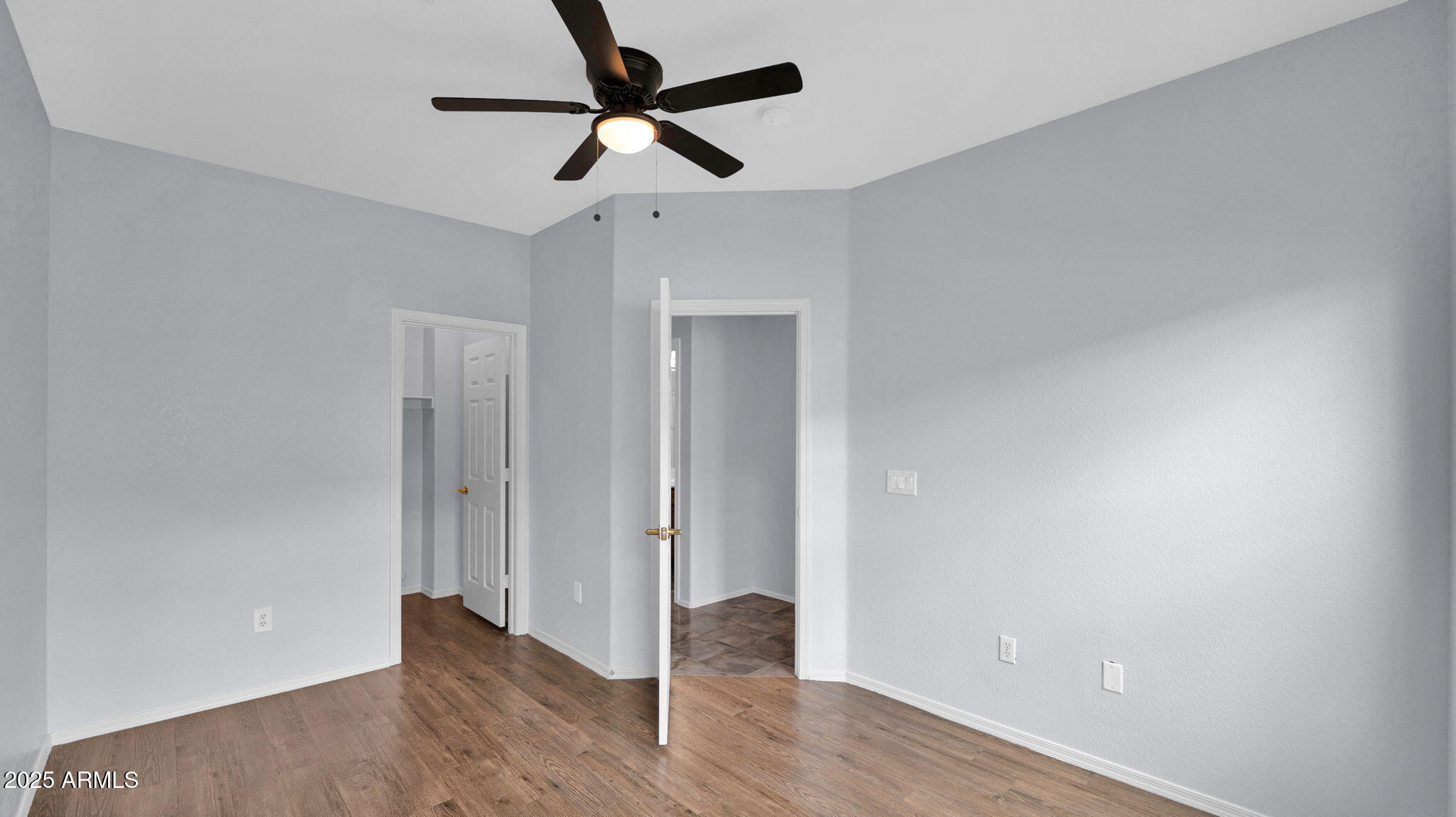 1702 East Bell Road, Unit 113 Phoenix, AZ 85022 - Photo 27 of 32 wooden floor in an empty room