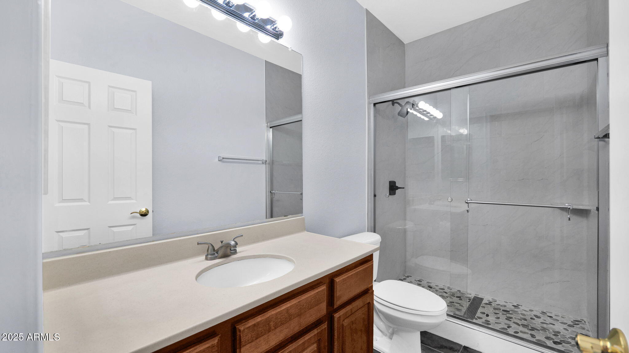 1702 East Bell Road, Unit 113 Phoenix, AZ 85022 - Photo 28 of 32 a bathroom with a sink a toilet and shower