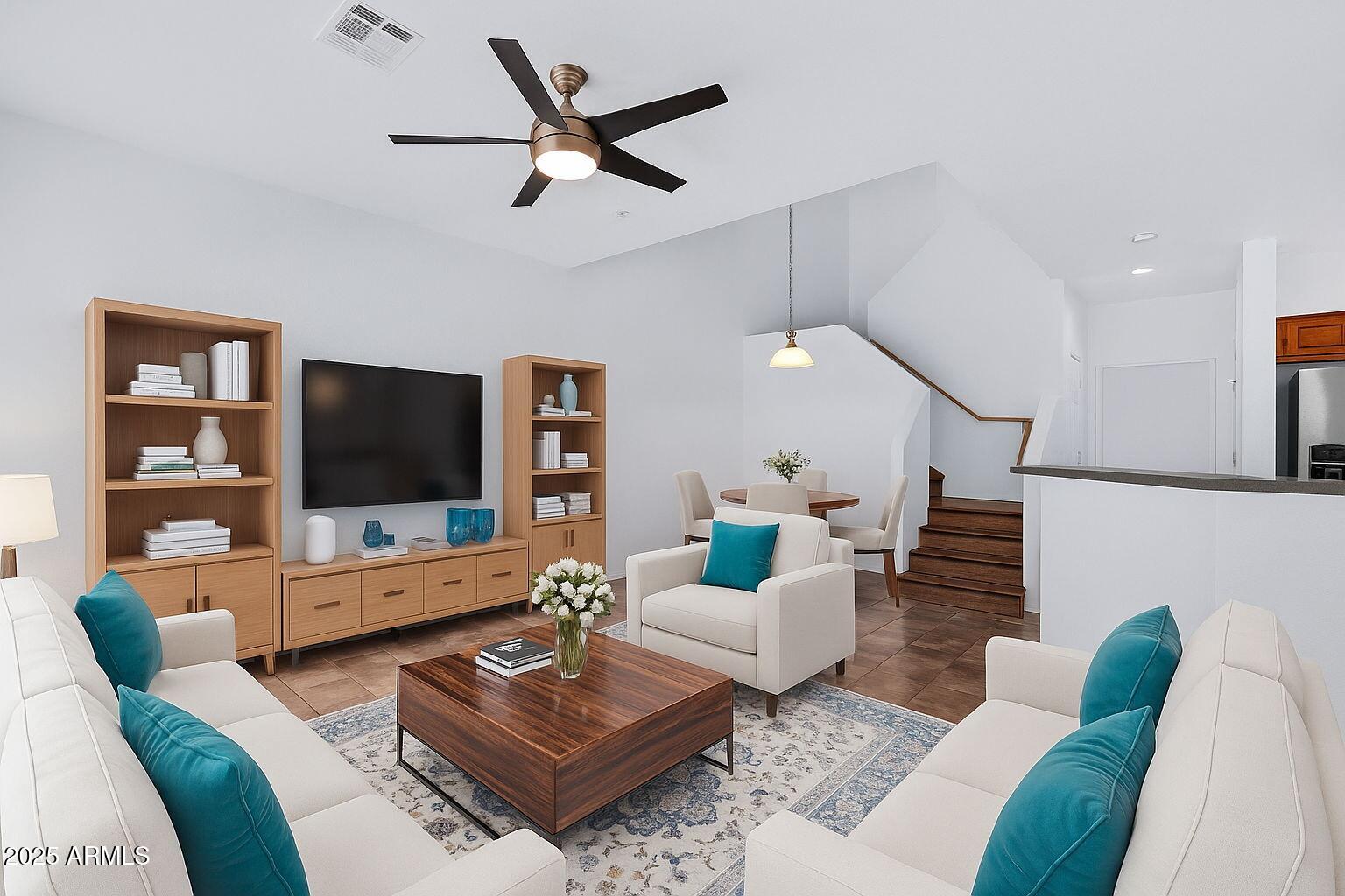 1702 East Bell Road, Unit 113 Phoenix, AZ 85022 - Photo 7 of 32 a living room with furniture and a flat screen tv