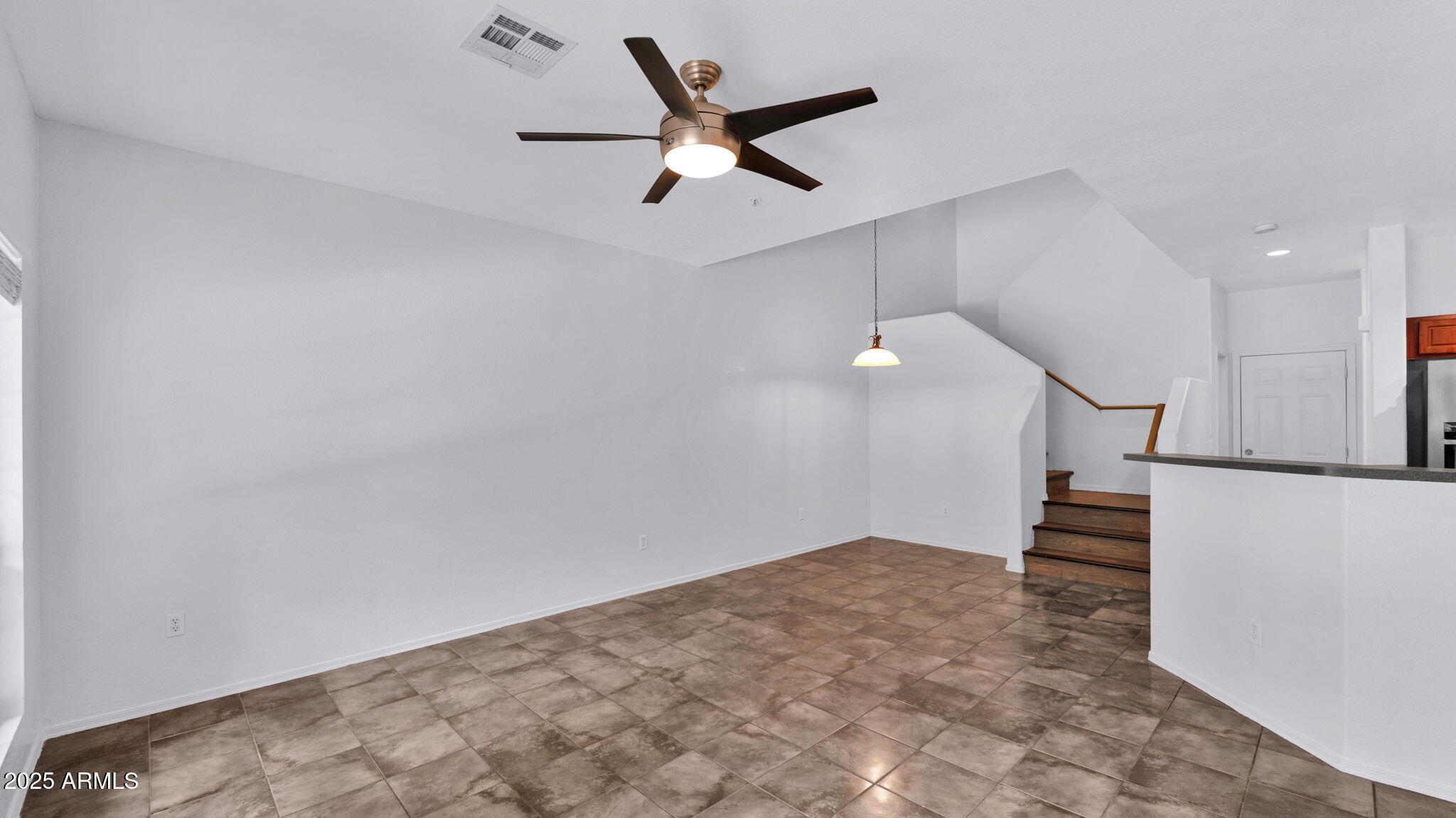 1702 East Bell Road, Unit 113 Phoenix, AZ 85022 - Photo 8 of 32 wooden floor in an empty room