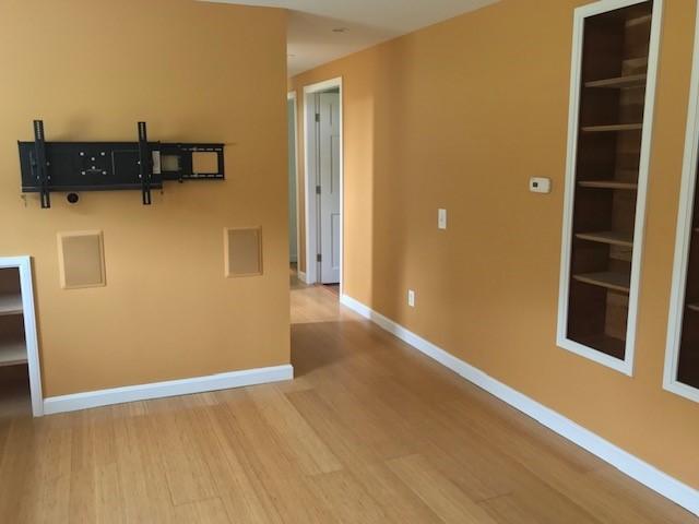 128 Swamp Road Durham, ME 04222 - Photo 27 of 39 Built in shelving and TV stand