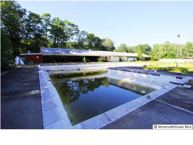 0 Fort Plains Road, Unit 131 175 Howell, NJ 07731 - Photo 11 of 25 a view of a swimming pool with a outdoor space