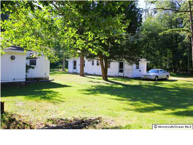 0 Fort Plains Road, Unit 131 175 Howell, NJ 07731 - Photo 17 of 25 a view of a house with a big yard