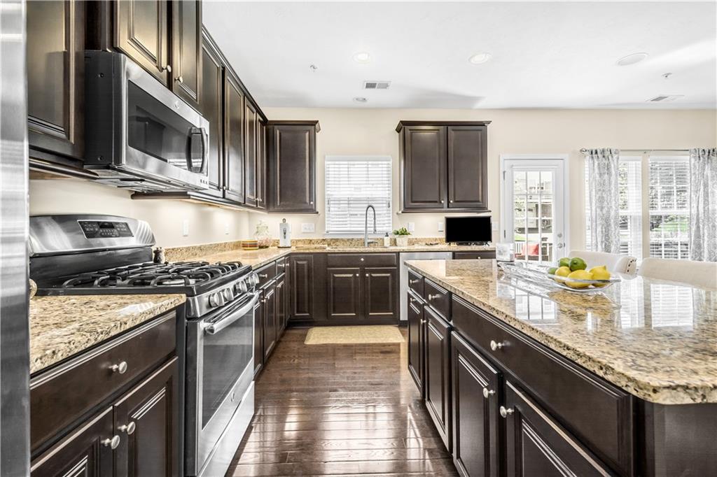 609 Rosecliff Road Wexford, PA 15090 - Photo 13 of 25 Cabinets, cabinets & more wood cabinets! The upper cabinets are 42" high. Don't forget the granite counters.