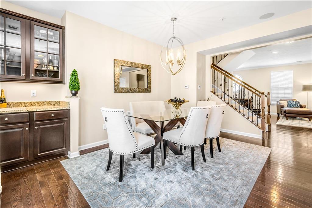 609 Rosecliff Road Wexford, PA 15090 - Photo 14 of 25 Elegant dining space featuring a beautiful, open light fixture.