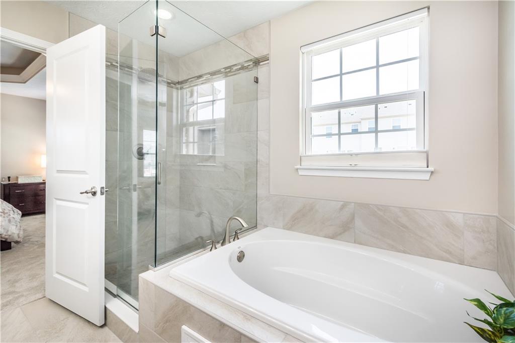 609 Rosecliff Road Wexford, PA 15090 - Photo 22 of 25 Soak your stress away! This custom renovation on the ensuite bathroom was done using quality materials & with attention to detail.