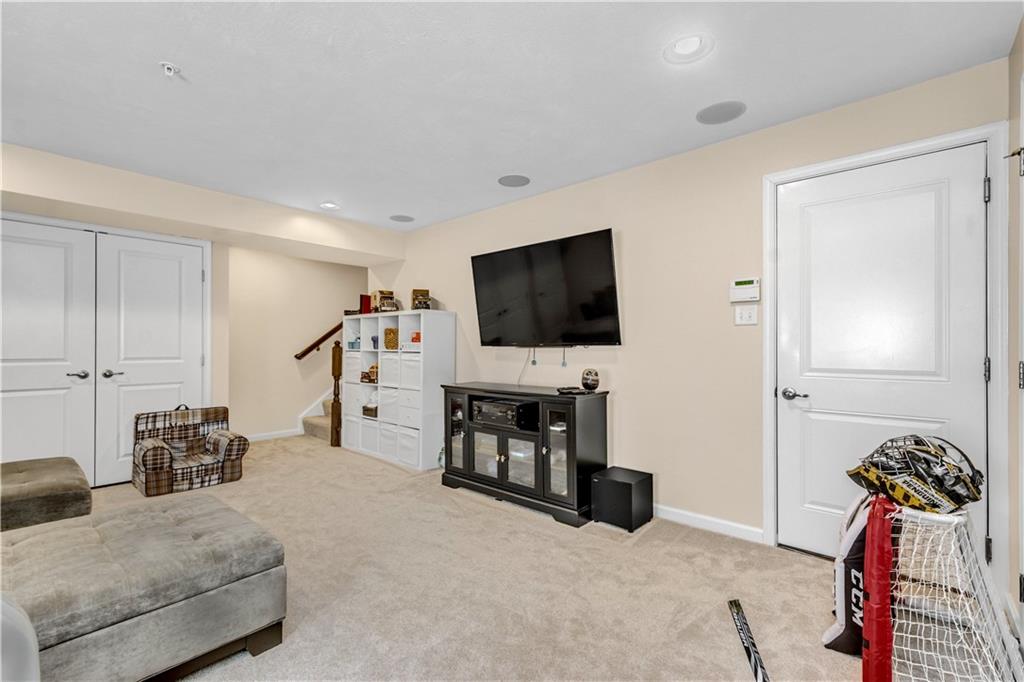 609 Rosecliff Road Wexford, PA 15090 - Photo 23 of 25 The lower level is wonderful place to play some games on & off the screen! Knee hockey anyone?