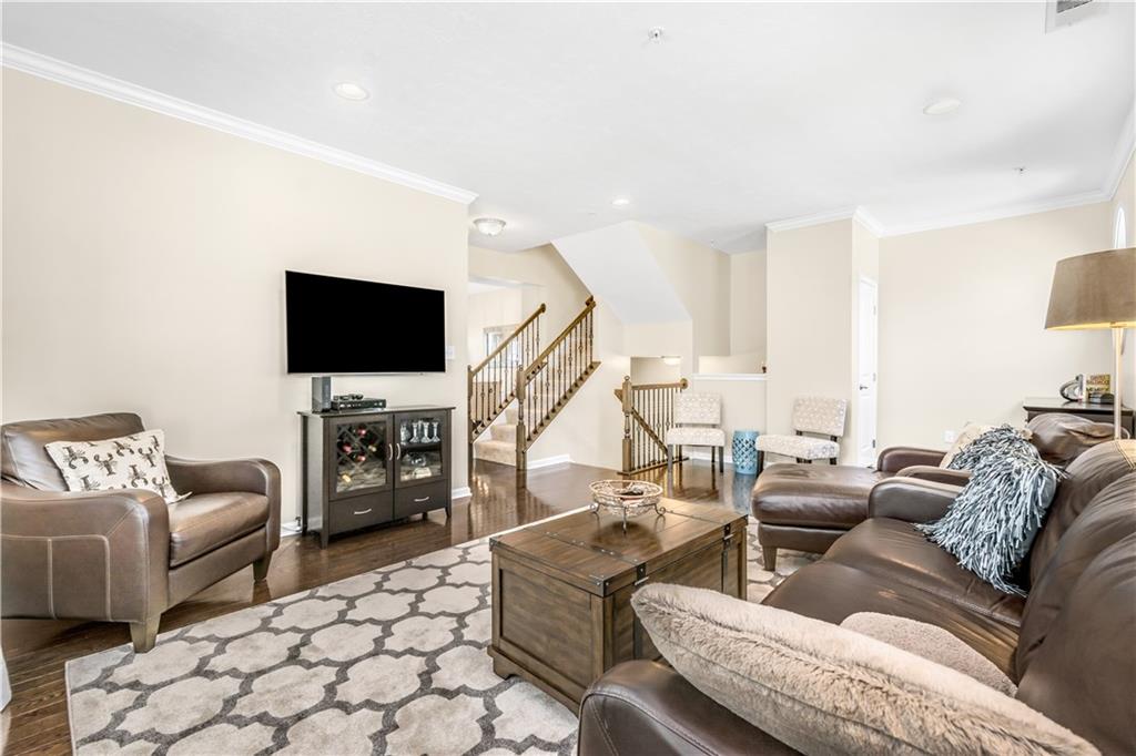609 Rosecliff Road Wexford, PA 15090 - Photo 8 of 25 Open-concept living with beautiful, gleaming hardwood throughout.