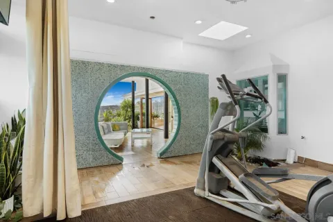 a view of storage and utility room with washer and dryer