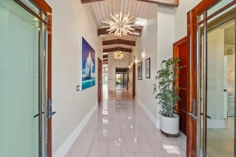 a kitchen with lots of counter top space and stainless steel appliances
