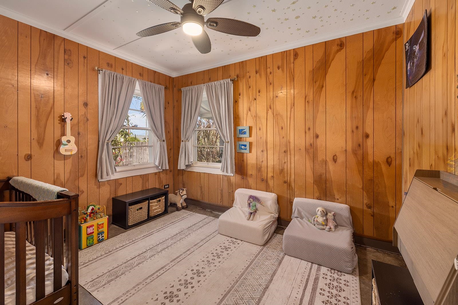 1697 Haiku Road Haiku, HI 96708 - Photo 12 of 48 a bedroom with furniture and a window