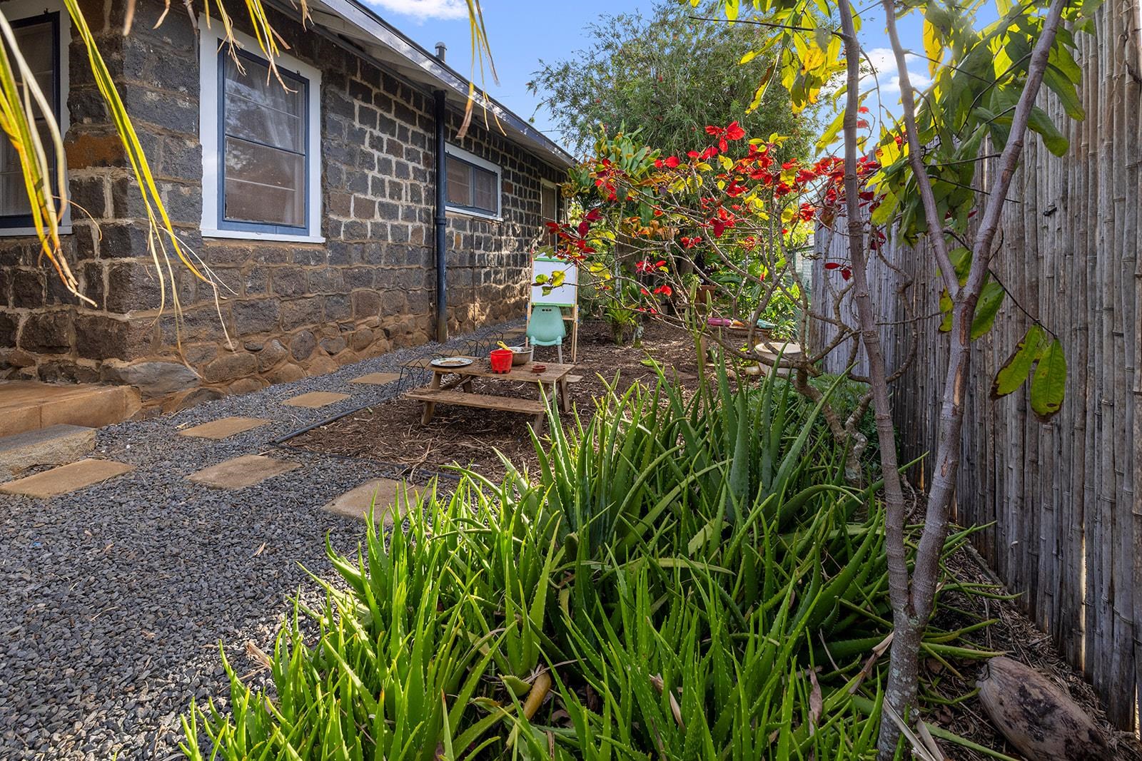 1697 Haiku Road Haiku, HI 96708 - Photo 15 of 48 a backyard of a house with lots of green space