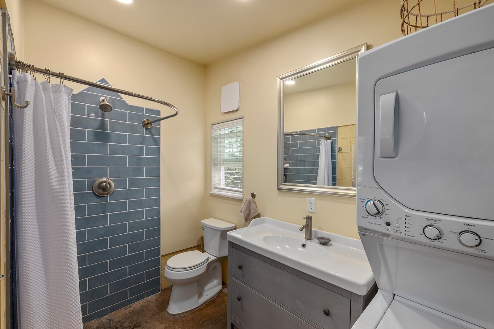 1697 Haiku Road Haiku, HI 96708 - Photo 27 of 48 a bathroom with a sink toilet and shower