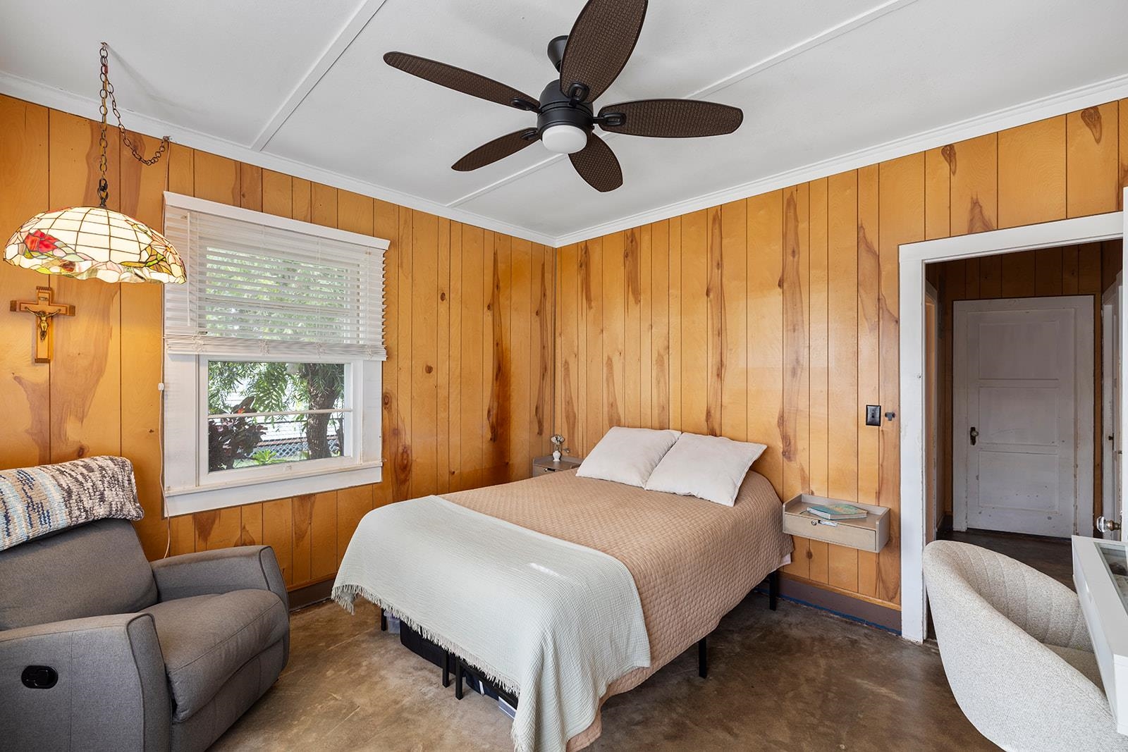 1697 Haiku Road Haiku, HI 96708 - Photo 6 of 48 a bedroom with a bed couch and window