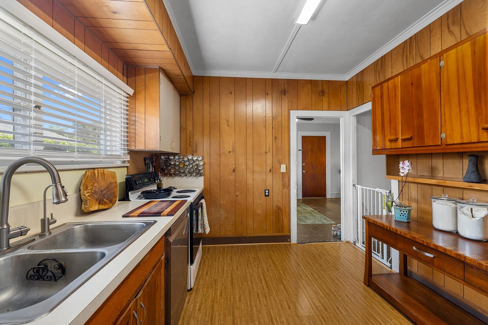 1697 Haiku Road Haiku, HI 96708 - Photo 9 of 48 a kitchen with stainless steel appliances granite countertop a sink stove and cabinets