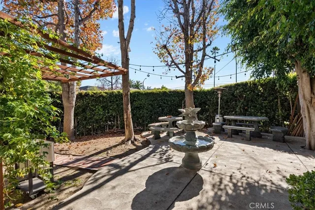 an aerial view of a house with a garden