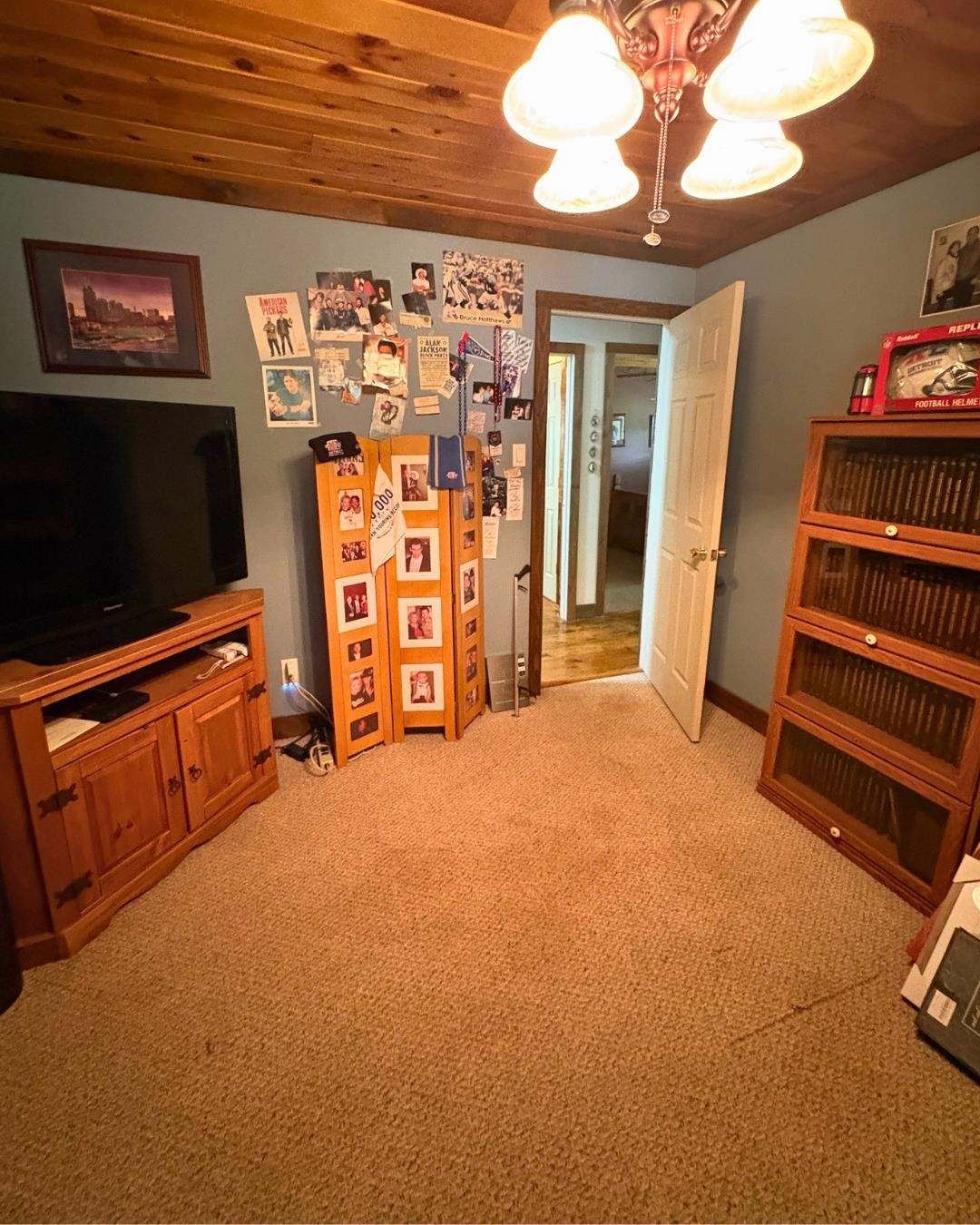 772 Rushing Road Michie, TN 38357 - Photo 12 of 19 Wood-paneled ceiling with a decorative ceiling fan light fixture