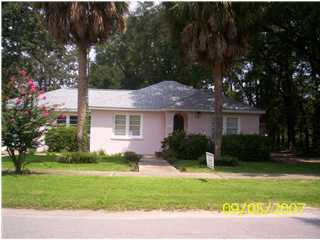 821 North Brett Street Crestview, FL 32536 - Photo 1 of 19 a front view of house with yard and green space