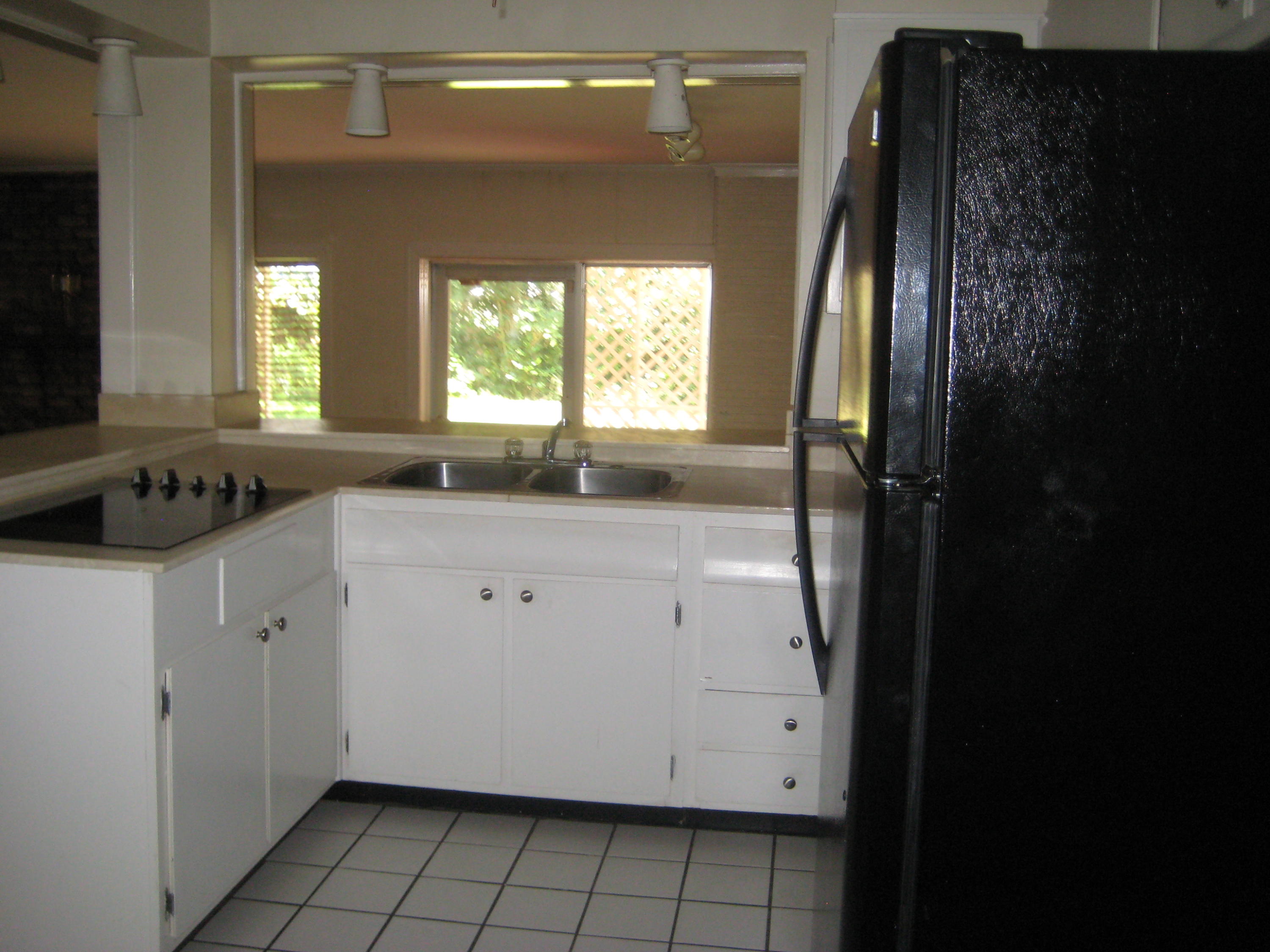 821 North Brett Street Crestview, FL 32536 - Photo 13 of 19 a view of a bathroom with a sink and a window