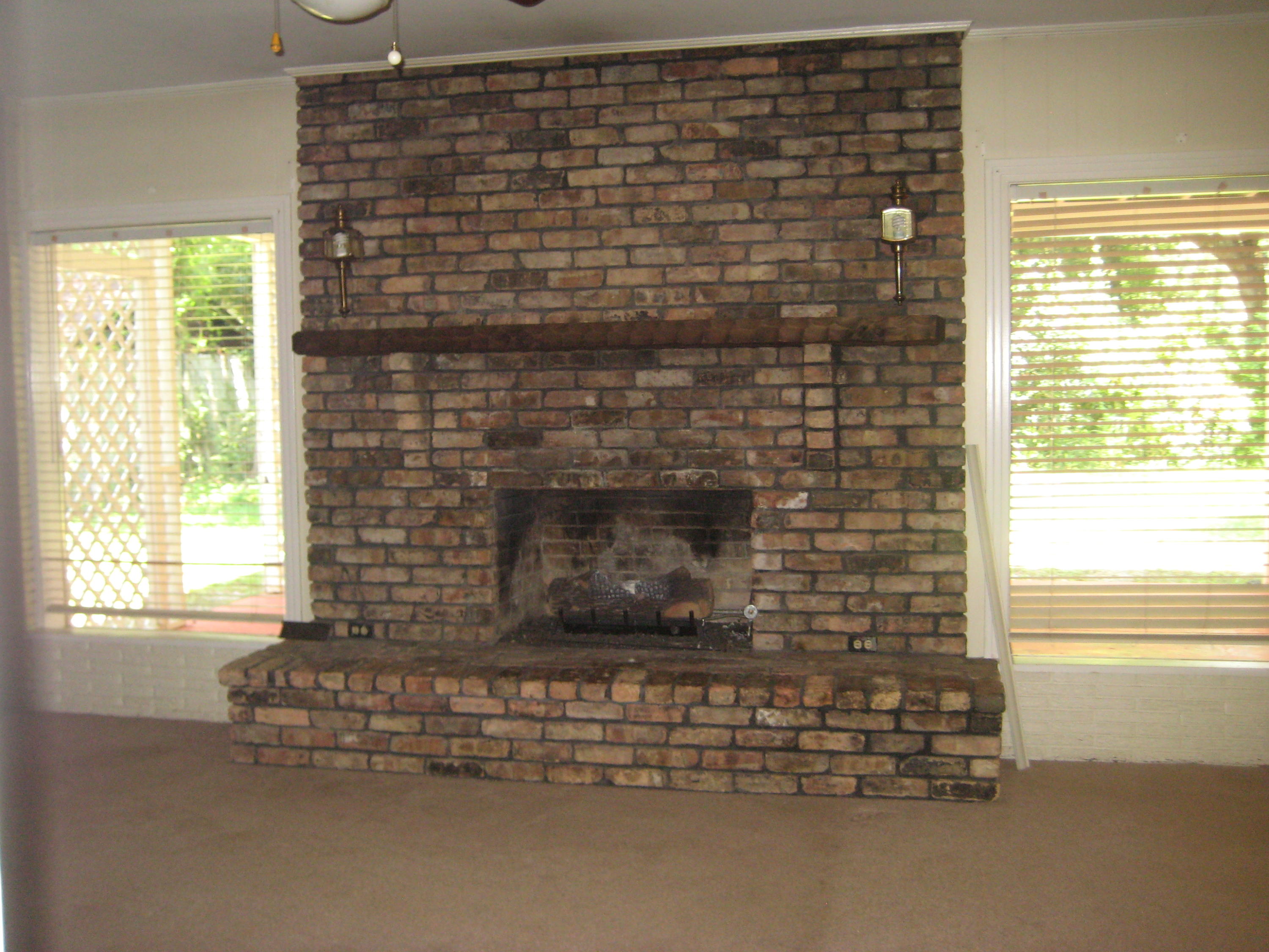 821 North Brett Street Crestview, FL 32536 - Photo 14 of 19 a room with a fireplace