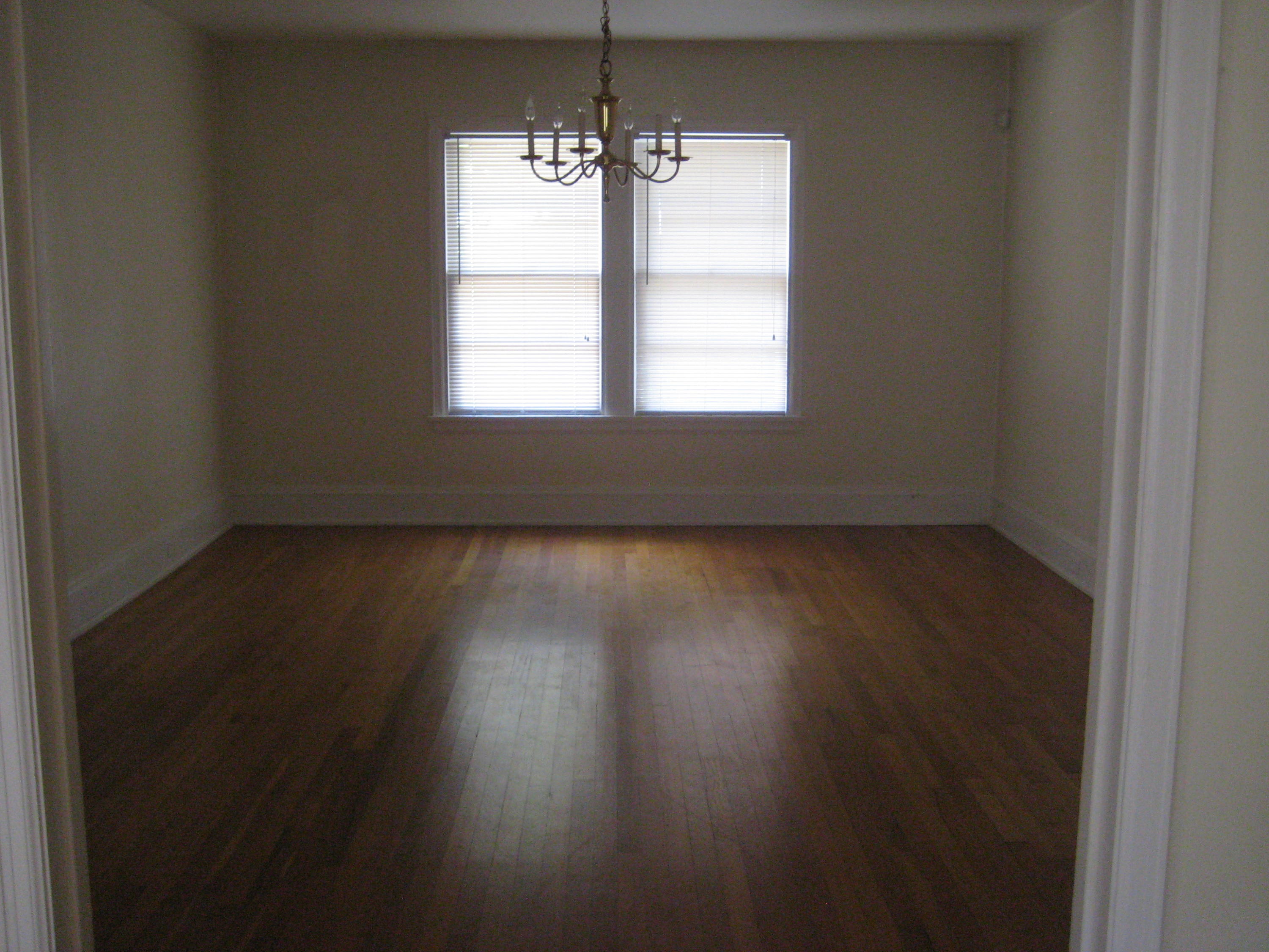 821 North Brett Street Crestview, FL 32536 - Photo 17 of 19 a view of wooden floor and windows in a room