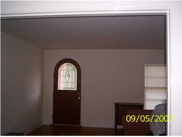 821 North Brett Street Crestview, FL 32536 - Photo 3 of 19 a view of front door with wooden floor