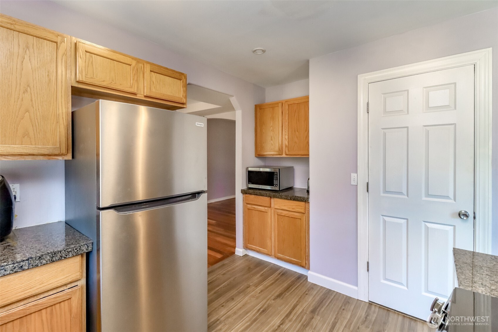 2516 Harts Lake Road South Roy, WA 98580 - Photo 12 of 40 a kitchen with stainless steel appliances granite countertop a refrigerator and a stove top oven