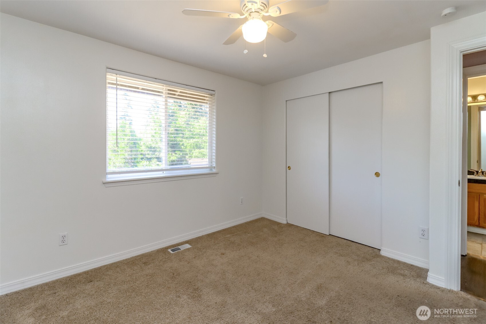 2516 Harts Lake Road South Roy, WA 98580 - Photo 23 of 40 a view of a livingroom with a ceiling fan and window