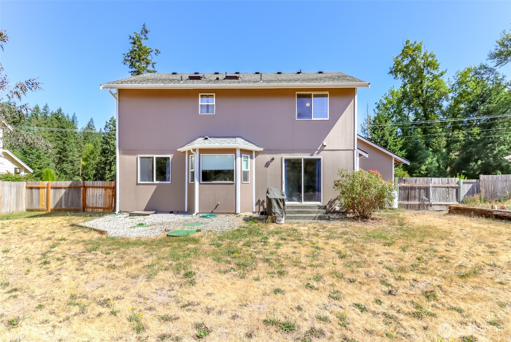 2516 Harts Lake Road South Roy, WA 98580 - Photo 31 of 40 a front view of a house with a yard