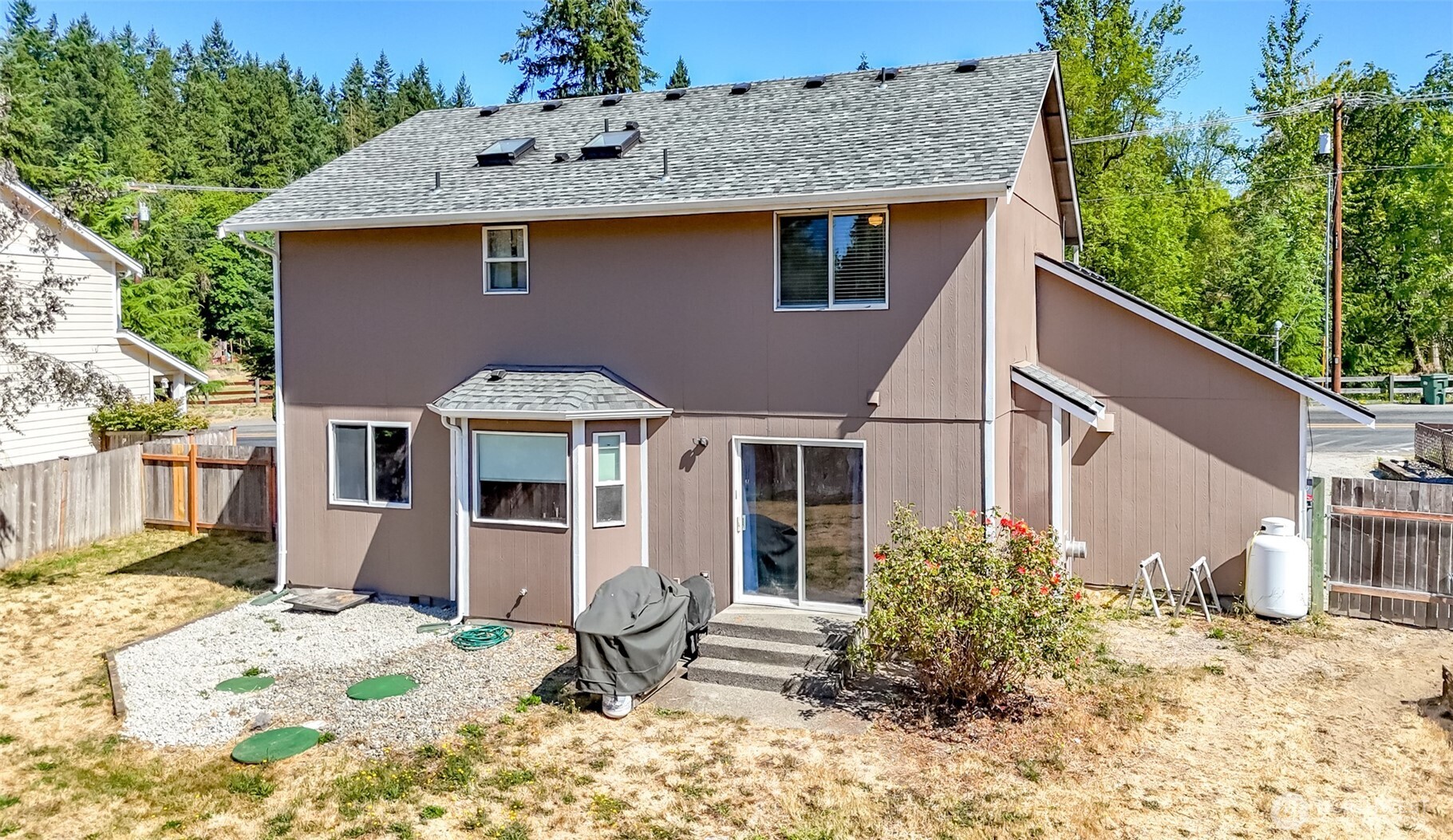 2516 Harts Lake Road South Roy, WA 98580 - Photo 33 of 40 a front view of a house with a yard and seating space