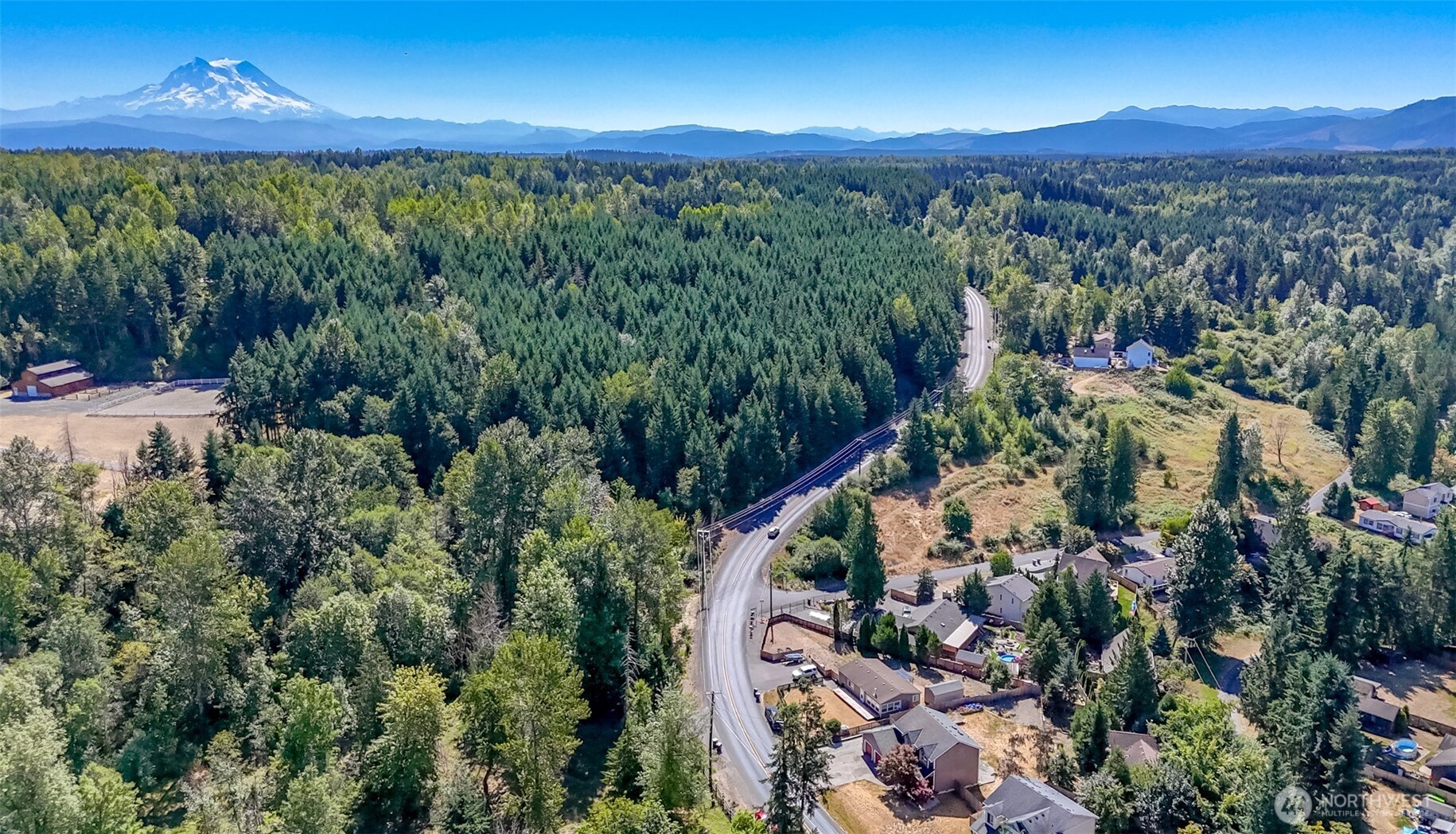 2516 Harts Lake Road South Roy, WA 98580 - Photo 40 of 40 a view of a city with lush green forest