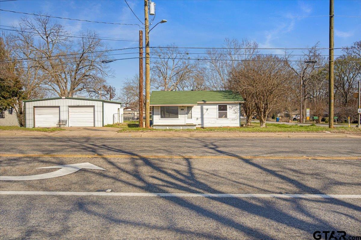 a view of a building with a street